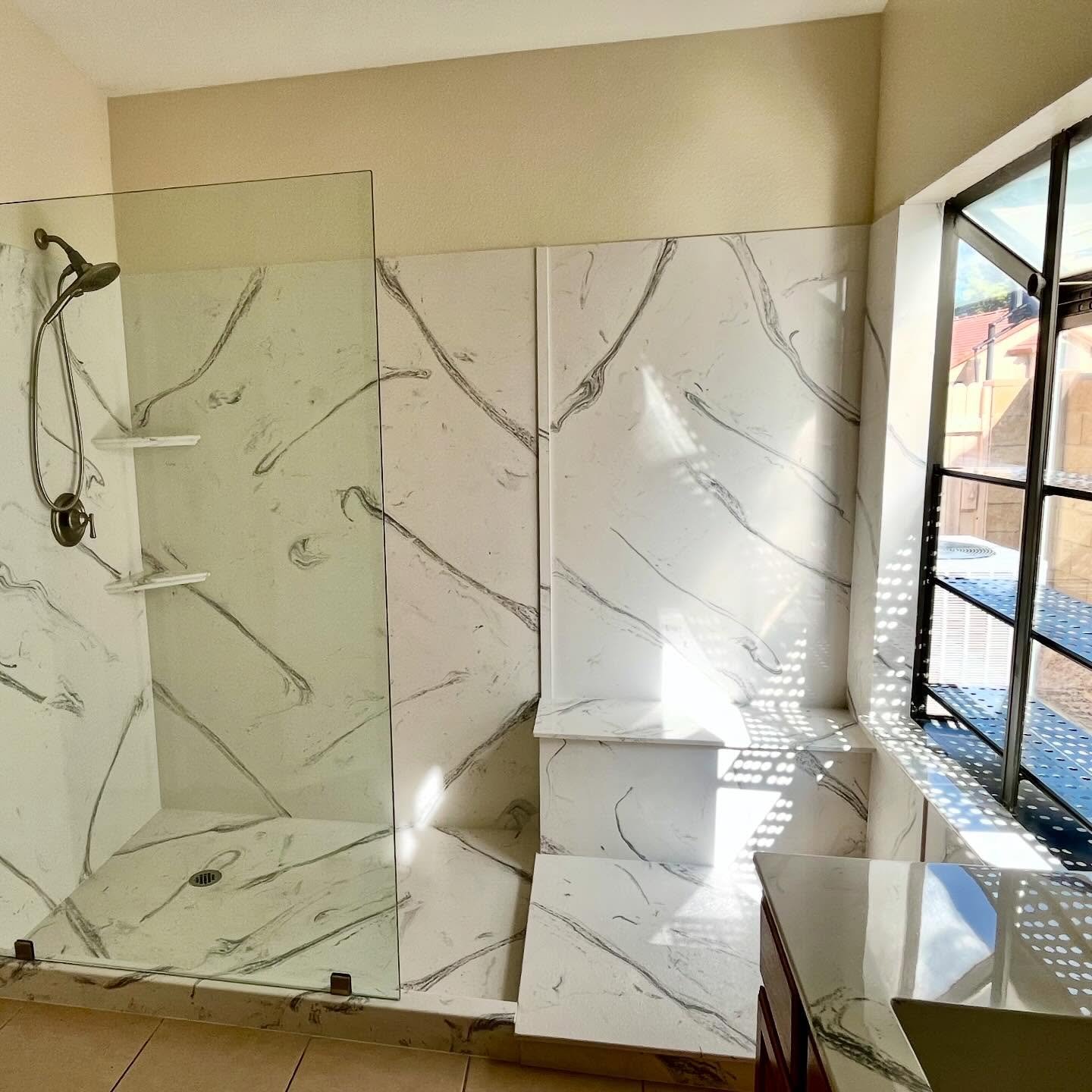 Walk-In Shower Remodel: Replacing a Tub/Shower Combo with a Seamless Slab Surround — after