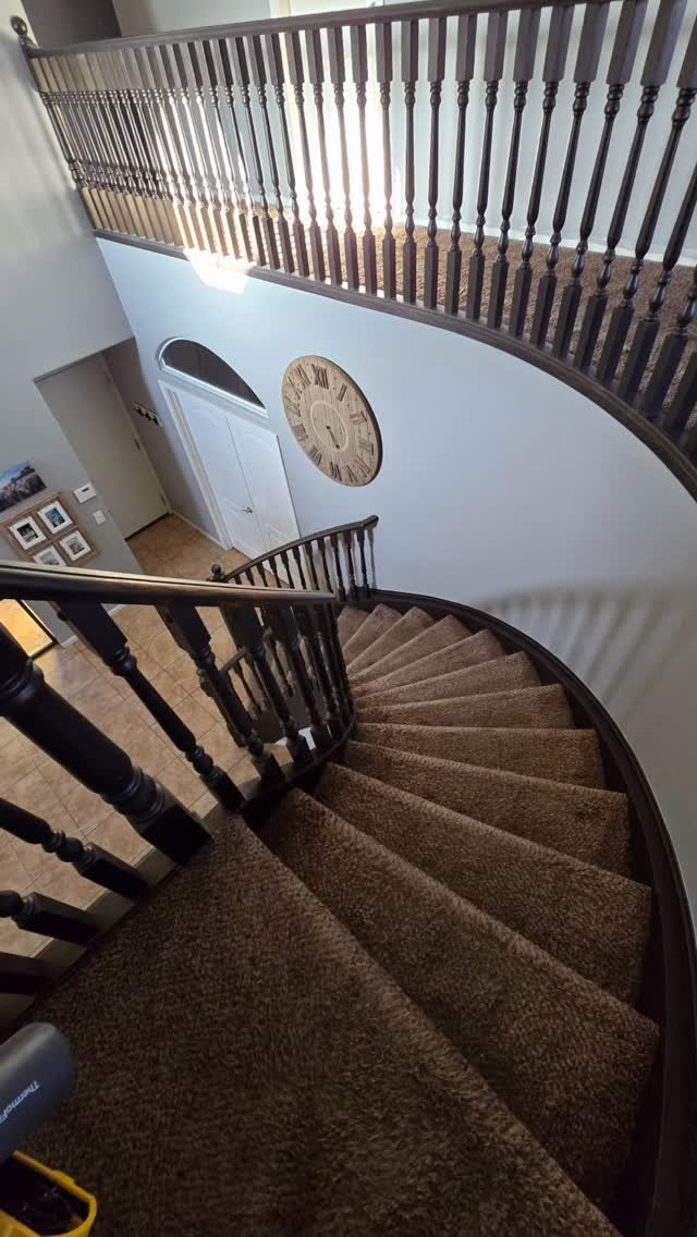 Before and after of the staircase and second-level flooring.